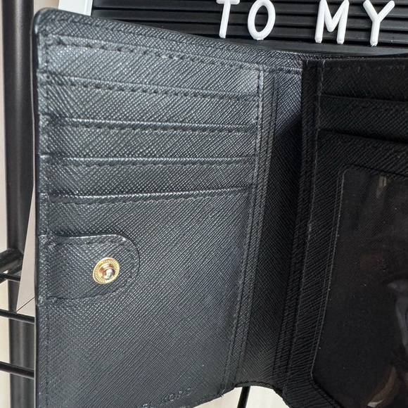 Black Michael Kors Wallet. L 5 1/4” W 1 1/2” H 4” - Picture 4 of 5